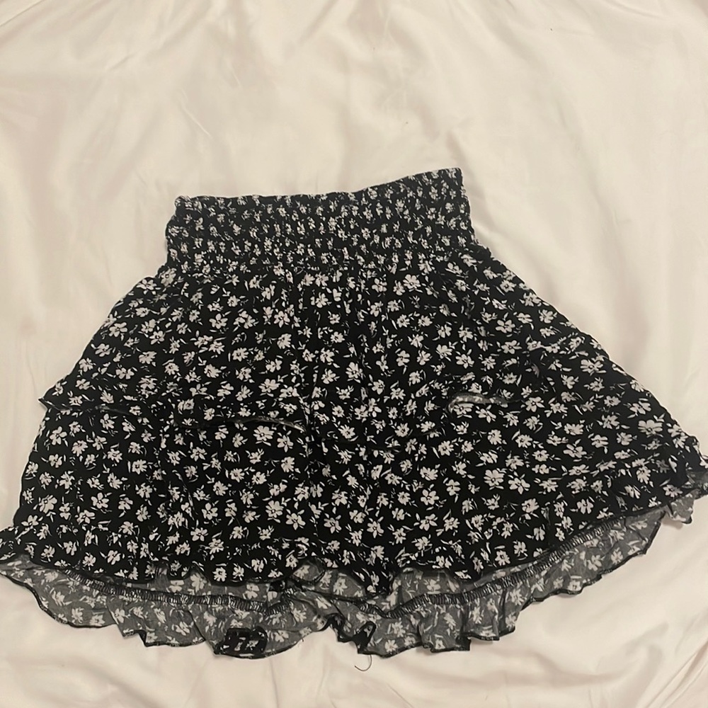 Brandy Melville skirt in a size xs, but is very stretchy.